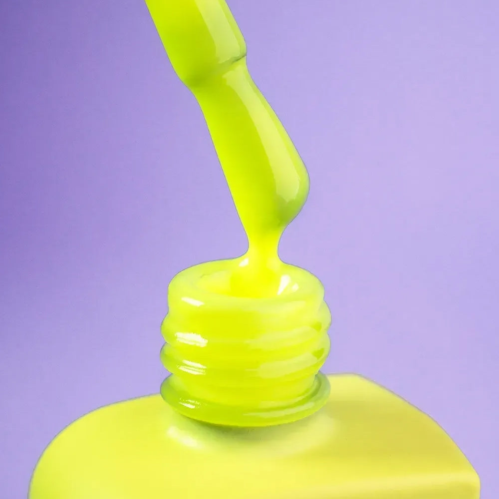 Hand shot of a complete manicure in 12ml Crash, bright opaque neon lemon finish