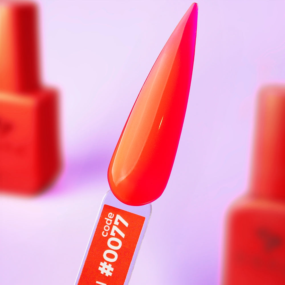 Hand shot of a complete manicure in 12ml Campari, bold red across all nails