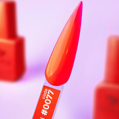 Hand shot of a complete manicure in 12ml Campari, bold red across all nails