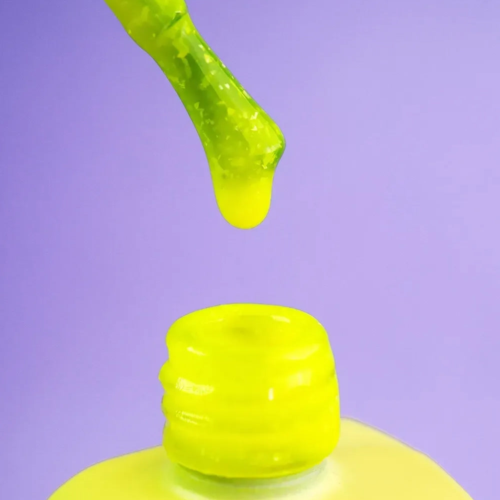 Close-up swatch of 12ml Joy, yellow tone with visible shimmer sparkle