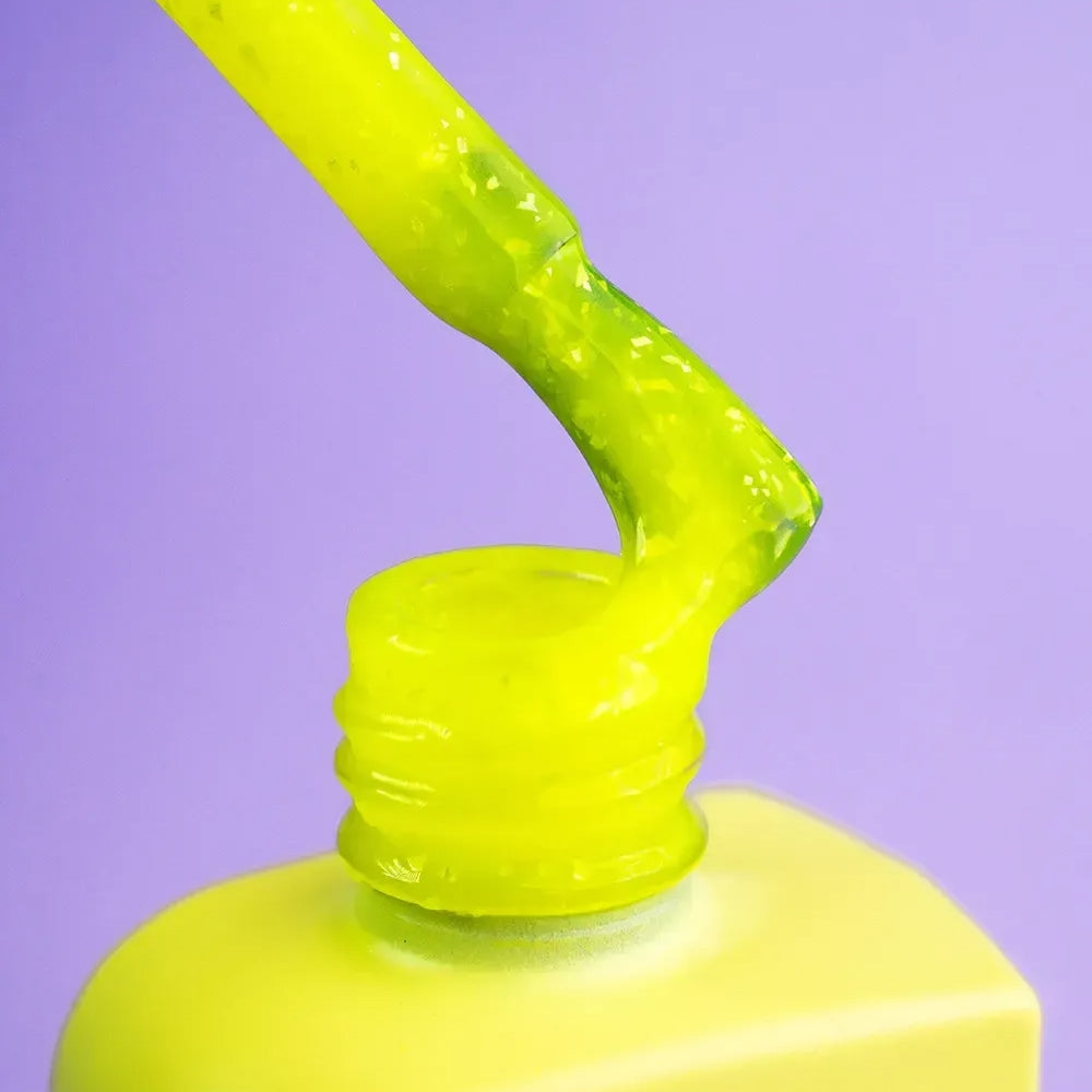 DNKa Cover Base #0079 Joy, 12ml bottle standing closed, yellow with shimmer effect
