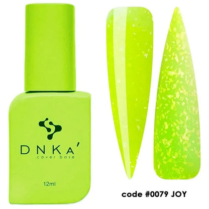 12ml bottle of Joy in yellow shimmer next to a DNKa top coat bottle