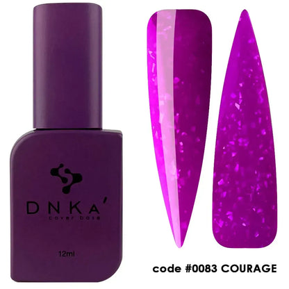 Macro shot of Courage gel on a nail tip — violet base, gold leaf pieces catching the light