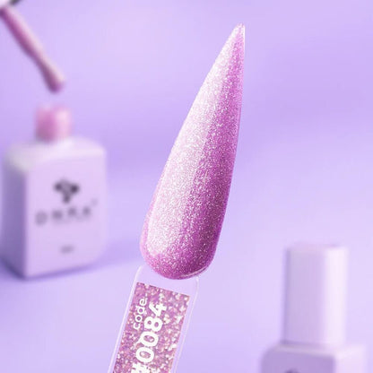 12ml — DNKa Cover Base #0084 Euphoria — swatch on nail tip, dark purple glitter camouflage base