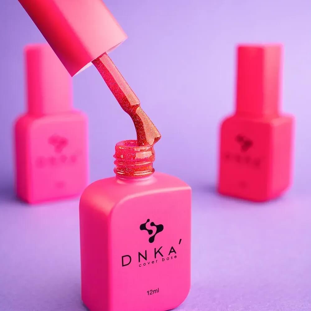 DNKa Cover Base #0085 Glam — swatch on nail tip, reflective pink camouflage base