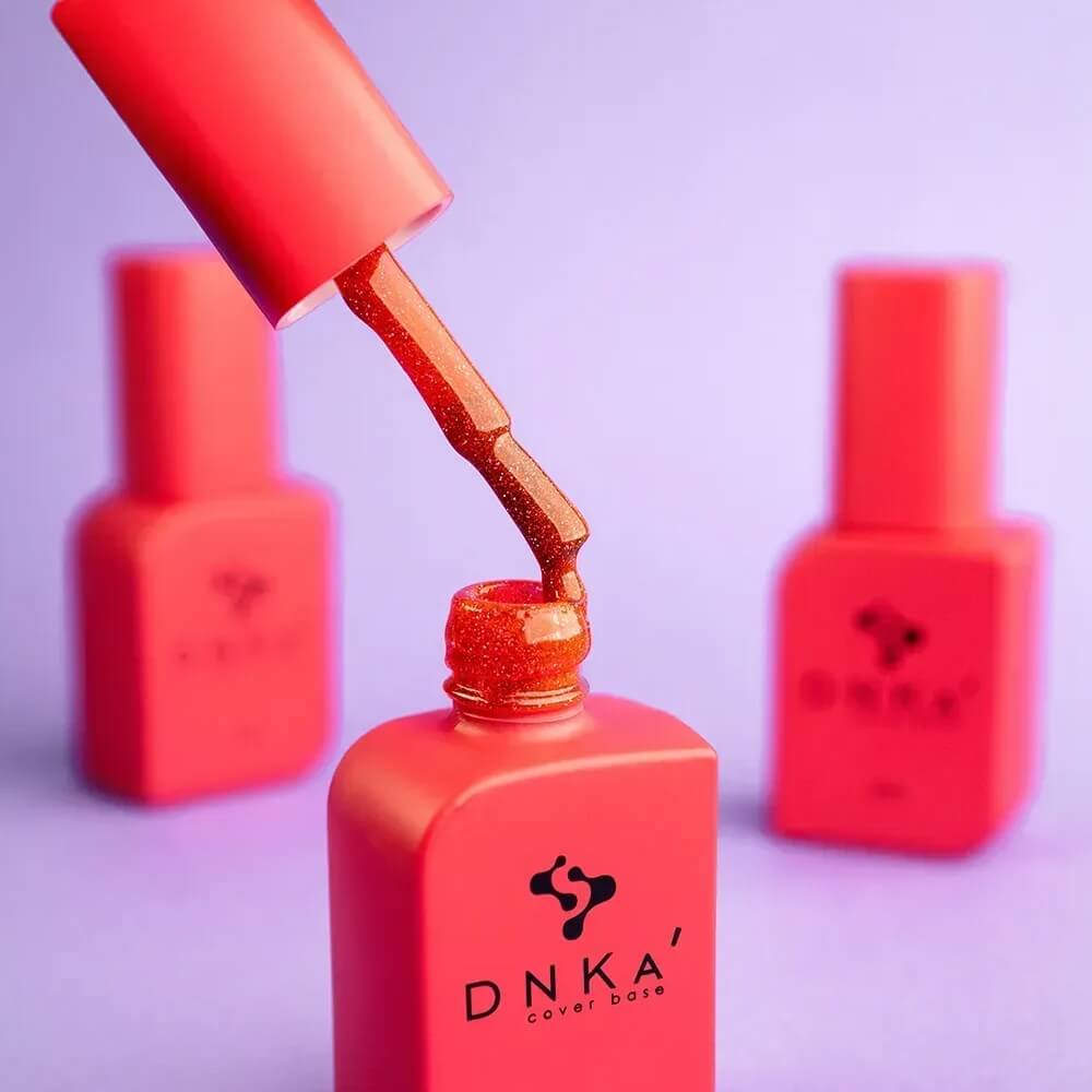 DNKa Cover Base #0086 Force — open bottle with brush, red-orange gel