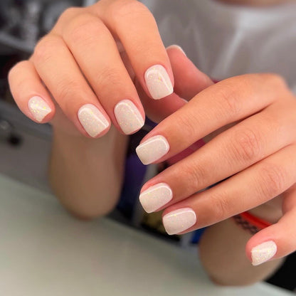 DNKa Cover Base #0095 Cocktail — open bottle with brush, milky gel with leaf flecks