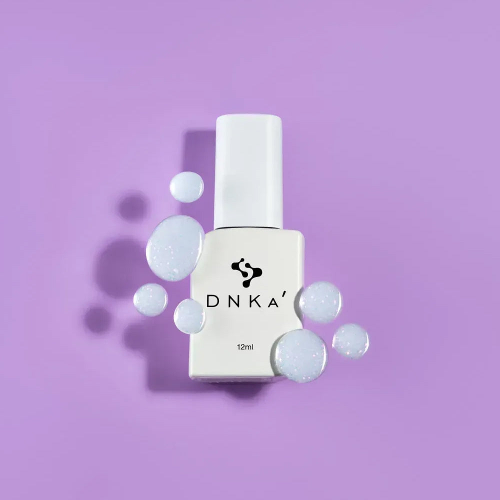 12ml — DNKa Cover Base #0095 Cocktail — single nail close-up, gold leaf on milky base