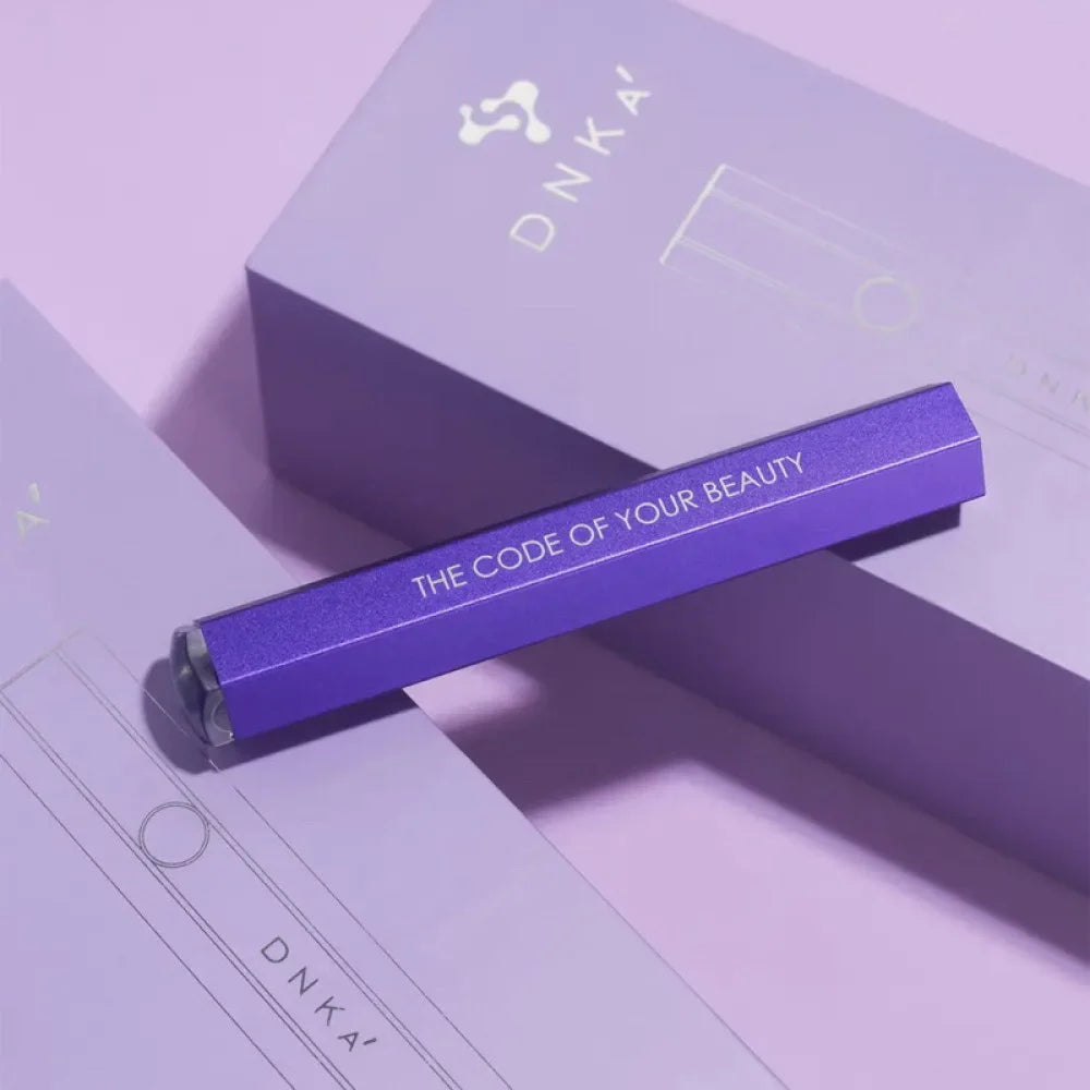 DNKa Lumos Light UV Lamp — purple, size comparison in hand