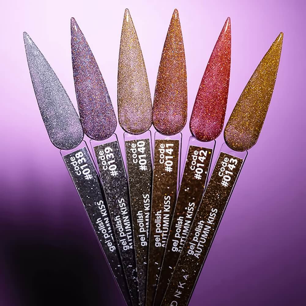 12ml — DNKa Gel Polish Color #0138 Autumn Kiss — swatch on nail tip, translucent silver shimmer