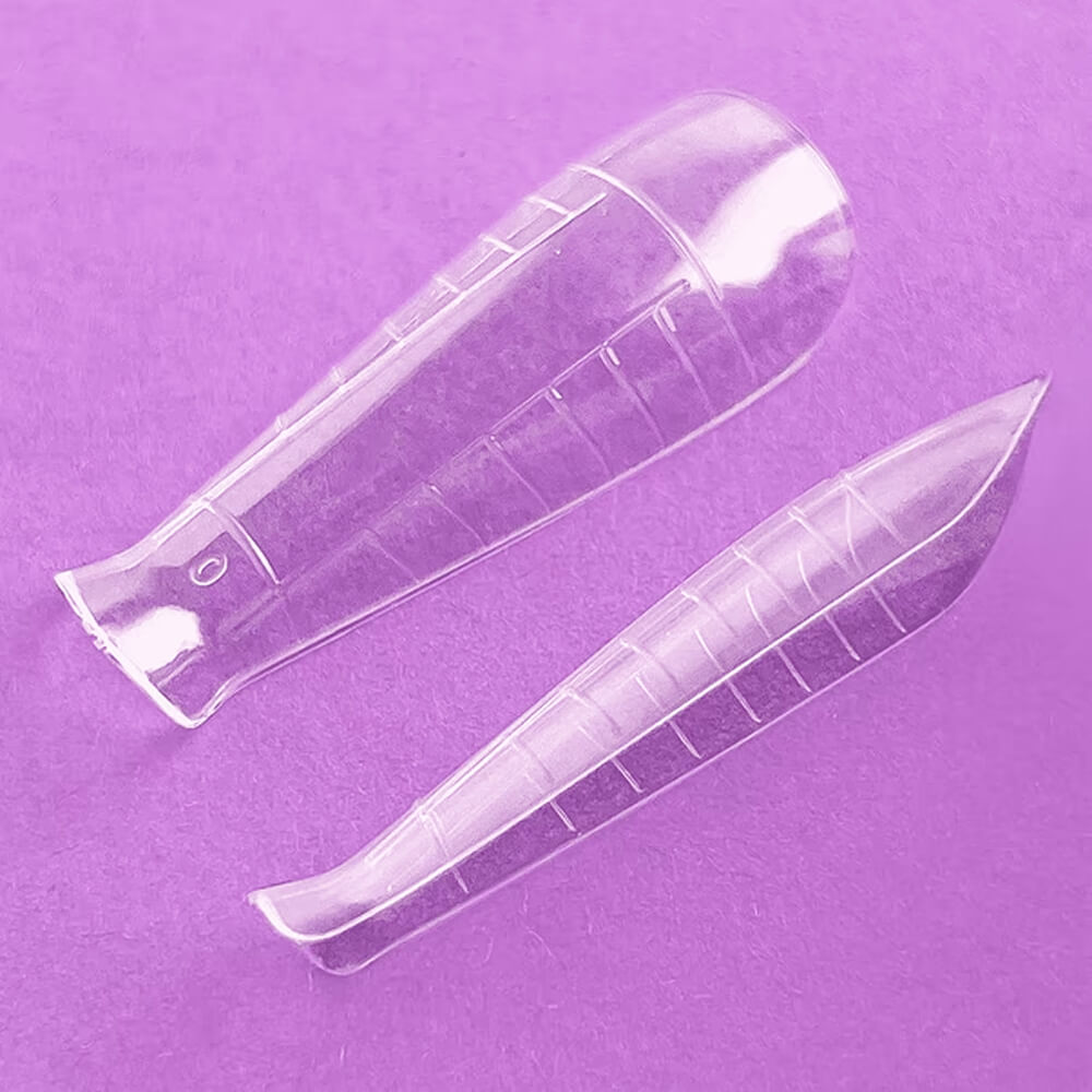 120pcs — DNKa Top Nail Forms Short Almond — single form close-up, short tapered shape