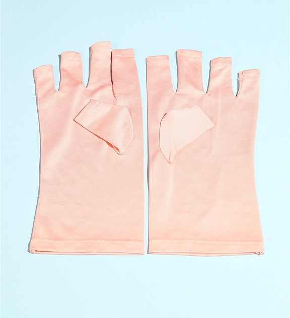 Pink nail gloves for gel polish curing under UV LED lamp