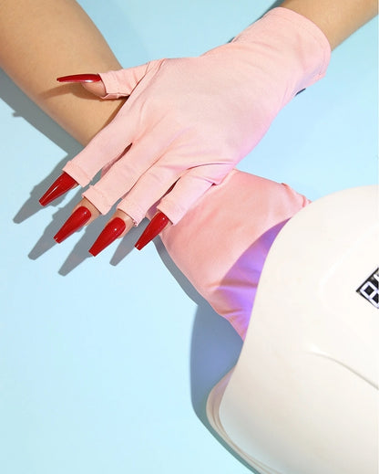 Pink fingerless manicure gloves for gel nail services