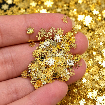 Gold snowflake nail art glitter with assorted thin metal Christmas decorations