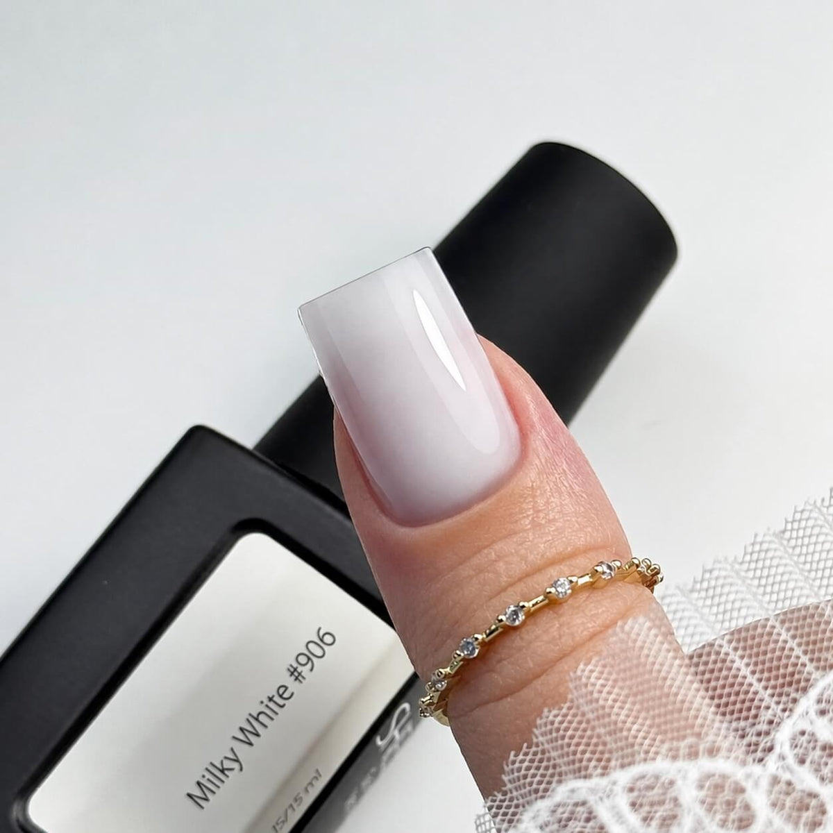 Milky White #906 builder gel in a wide-neck bottle