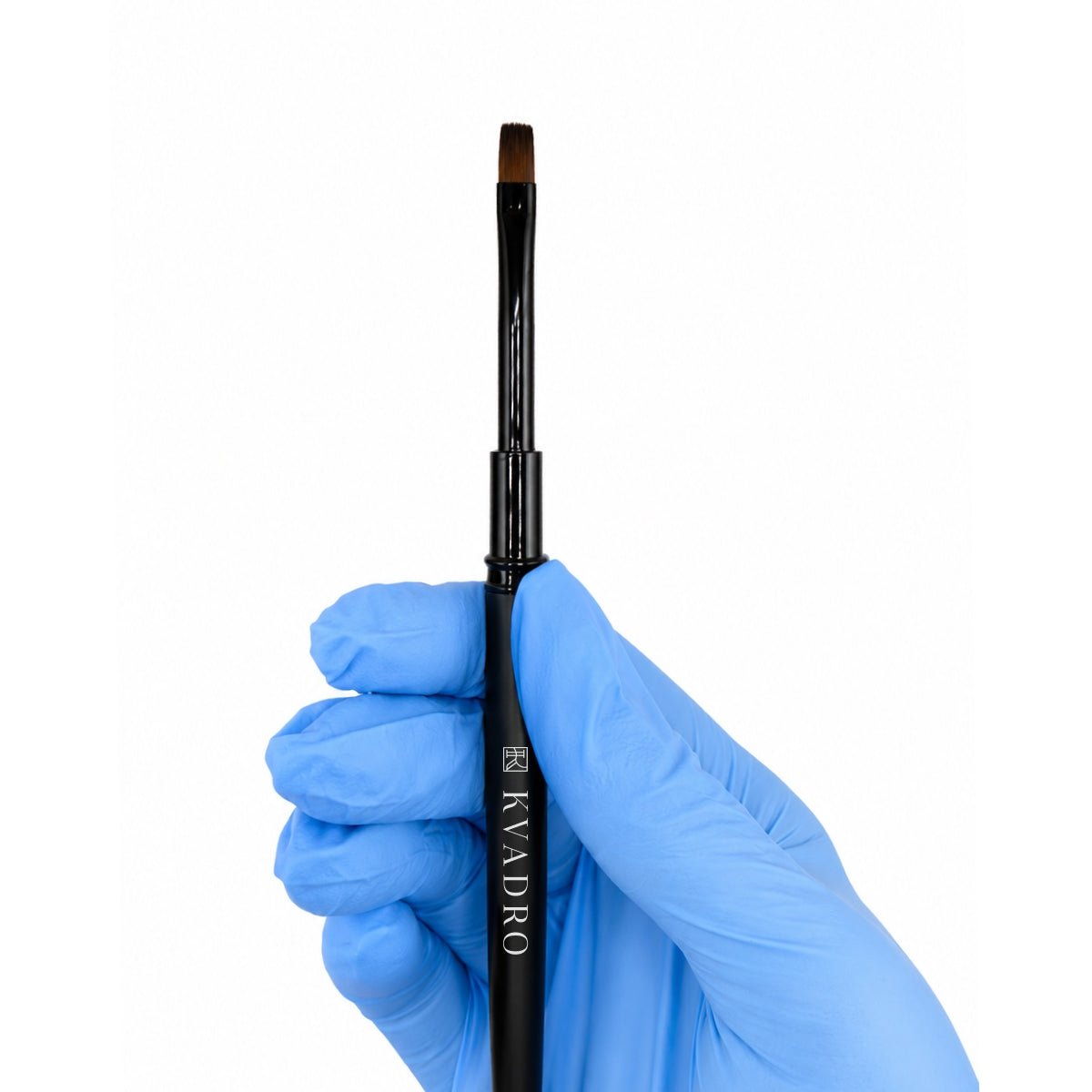 Close-up of the 6mm flat synthetic nylon bristles on the KVADRO Nail Brush