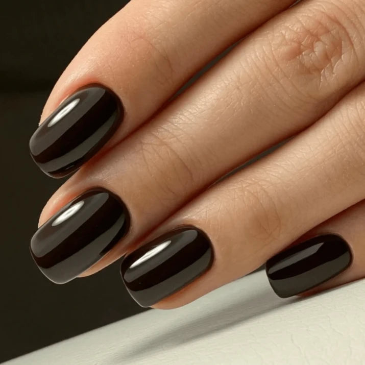 Luxio Aficionado Gel Polish — full manicure, rich dark brown coverage