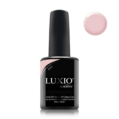 Luxio Bossy Gel Polish — bottle paired with a Luxio top coat