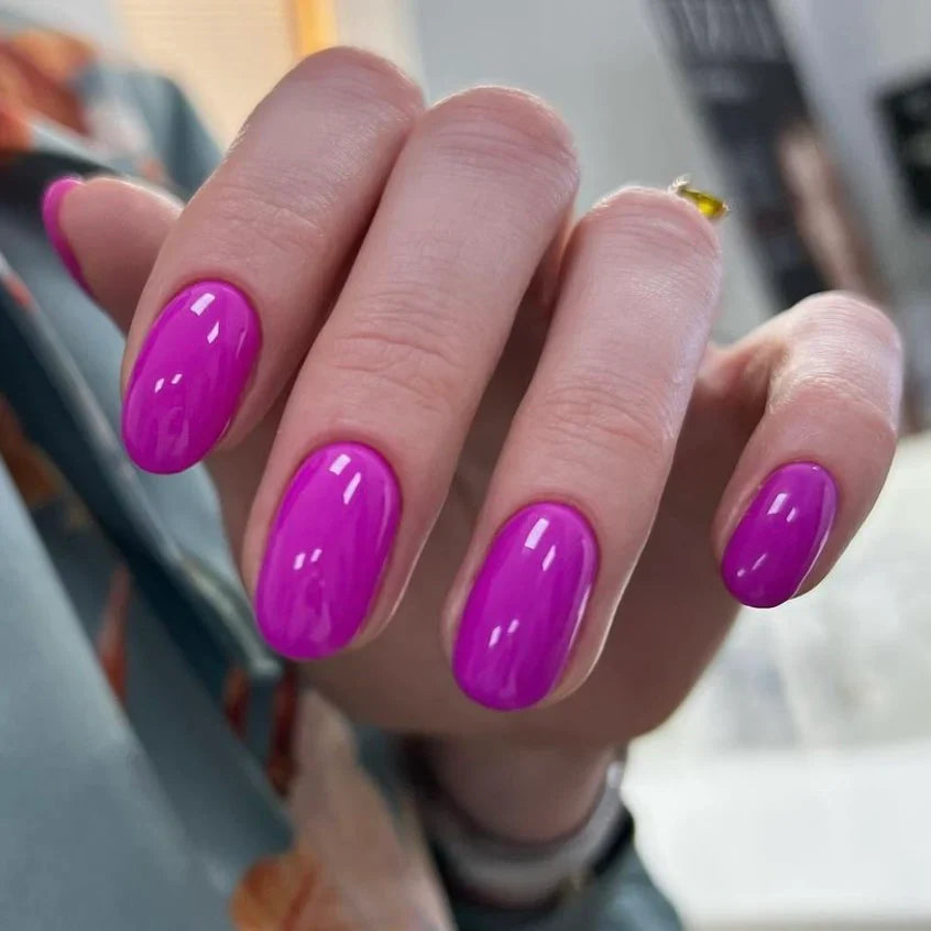 Luxio Chi-Chi Gel Polish — open bottle with brush, fuchsia gel