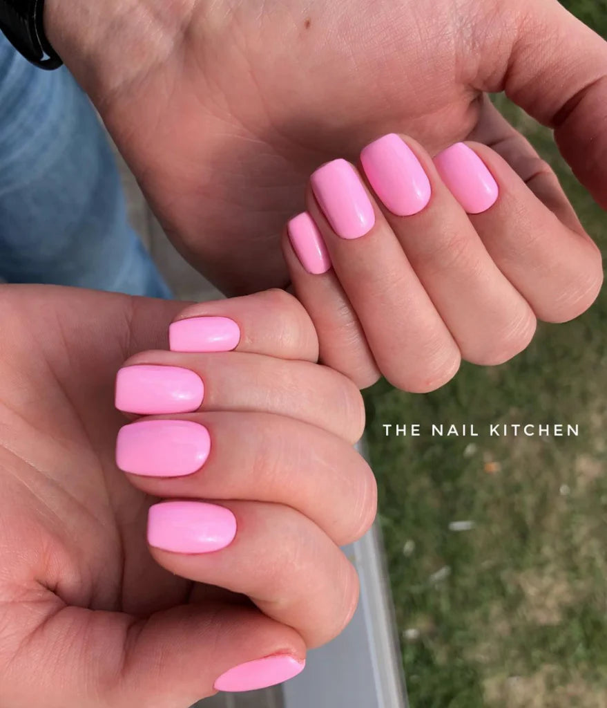 Luxio Delightful Gel Polish — full manicure, vibrant pink coverage