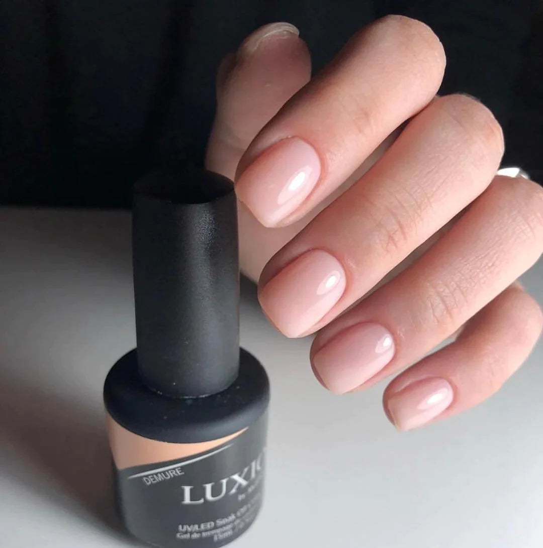 Luxio Demure Gel Polish — full manicure, sheer warm pink coverage
