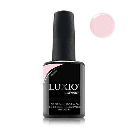 Luxio Demure Gel Polish — single nail close-up, glossy sheer finish