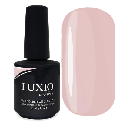 15ml — Luxio Demure Gel Polish — swatch on nail tip, sheer pink finish