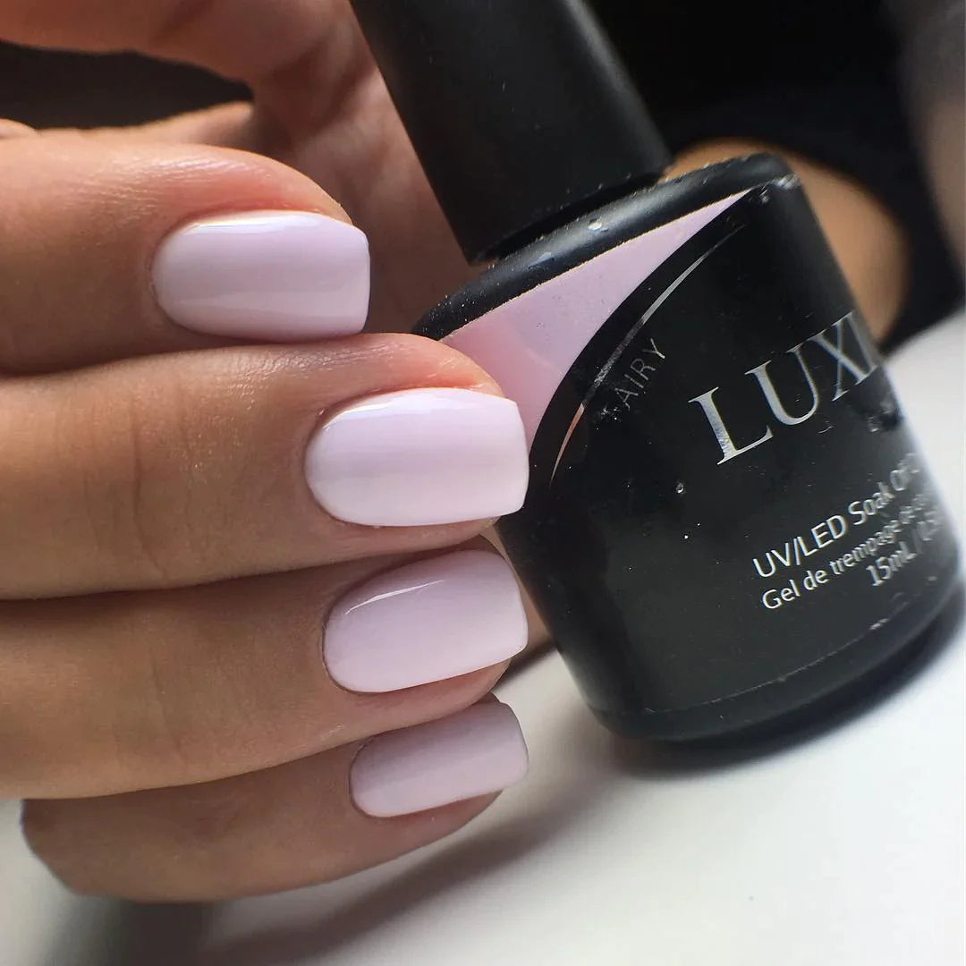 Luxio Fairy Gel Polish — swatch on nail tip, pale pink finish