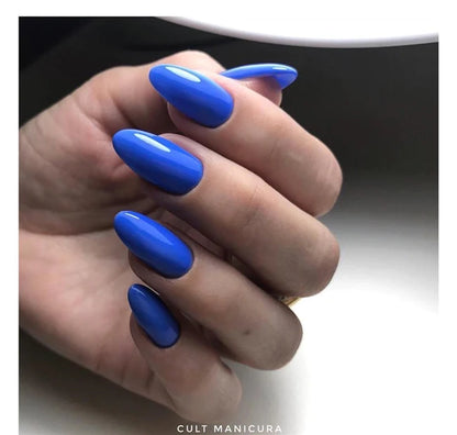 Luxio Fanfare Gel Polish — swatch on nail tip, purple-toned blue finish