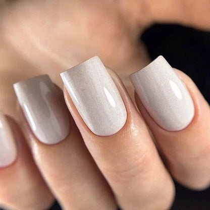 9ml — Luxio Flirt Gel Polish — full manicure, pale beige shimmer coverage