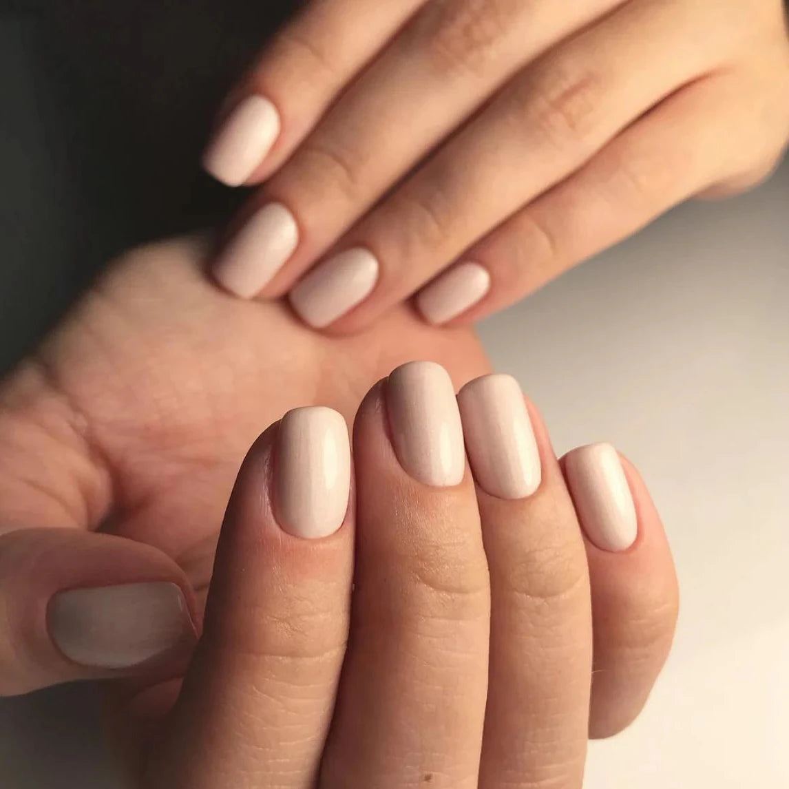 Luxio Flirt Gel Polish — bottle paired with a Luxio top coat