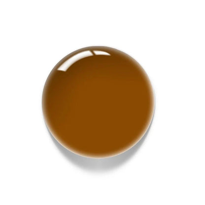 Luxio Ochre Gel Polish — swatch on nail tip, golden yellow finish