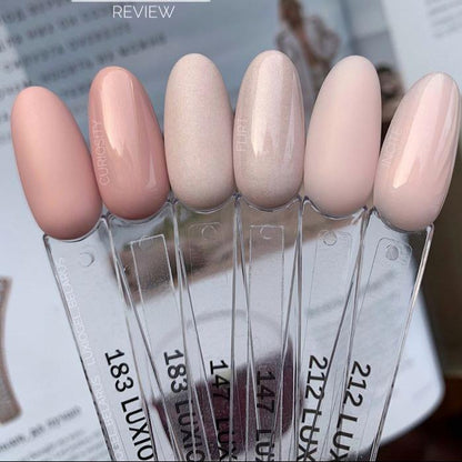 Luxio Incite Gel Polish — bottle paired with a Luxio top coat