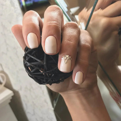 Luxio Ivory Gel Polish — bottle paired with a Luxio top coat