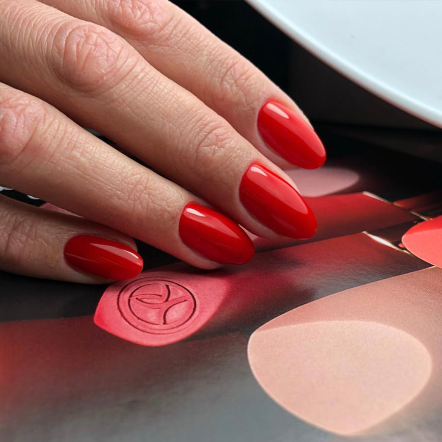 Luxio Prerogative Gel Polish — full manicure, bright cool-toned red