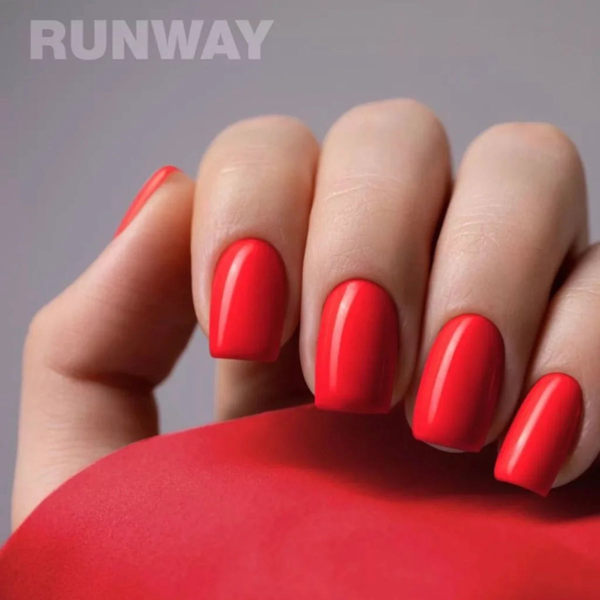 Luxio Runway Gel Polish — open bottle with brush, red gel