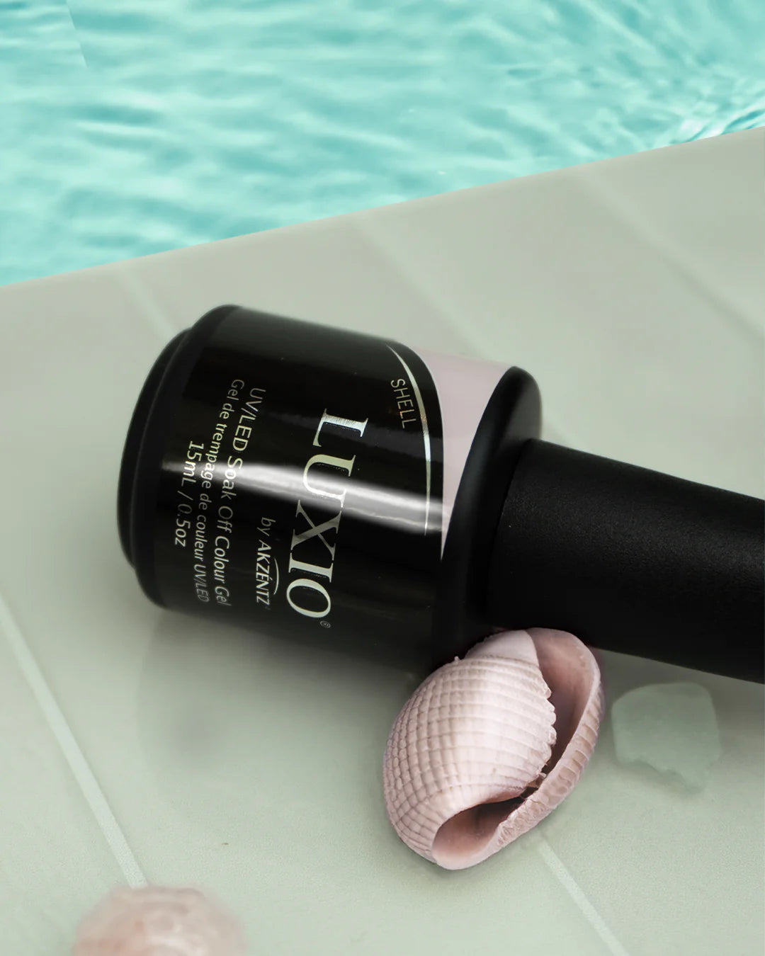Luxio Shell Gel Polish — open bottle with brush, shell pink gel