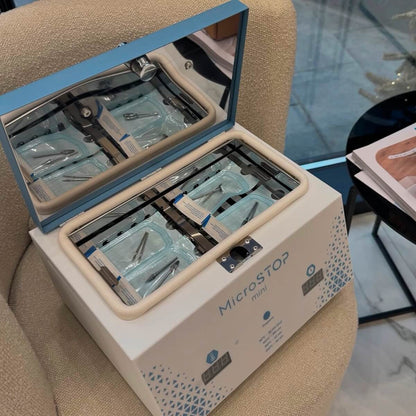 The MicroStop Mini dry heat sterilizer fits 2 tool sets in a compact frame for small salons.