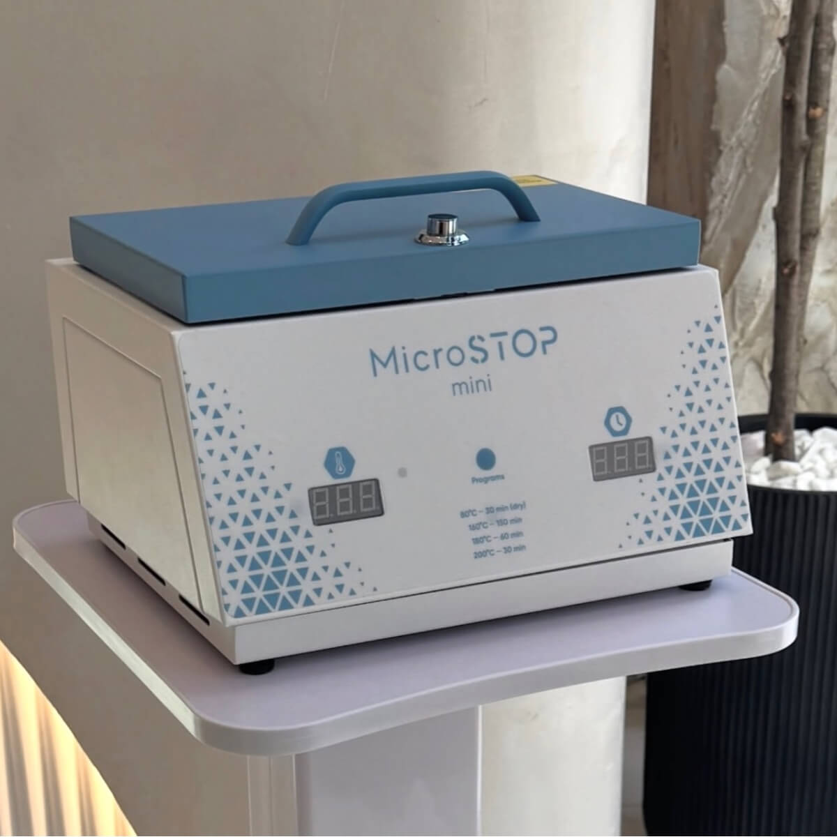 This is a compact dry heat sterilizer built for small salons and independent nail technicians who need reliable tool sterilization without the footprint of a full-size unit.