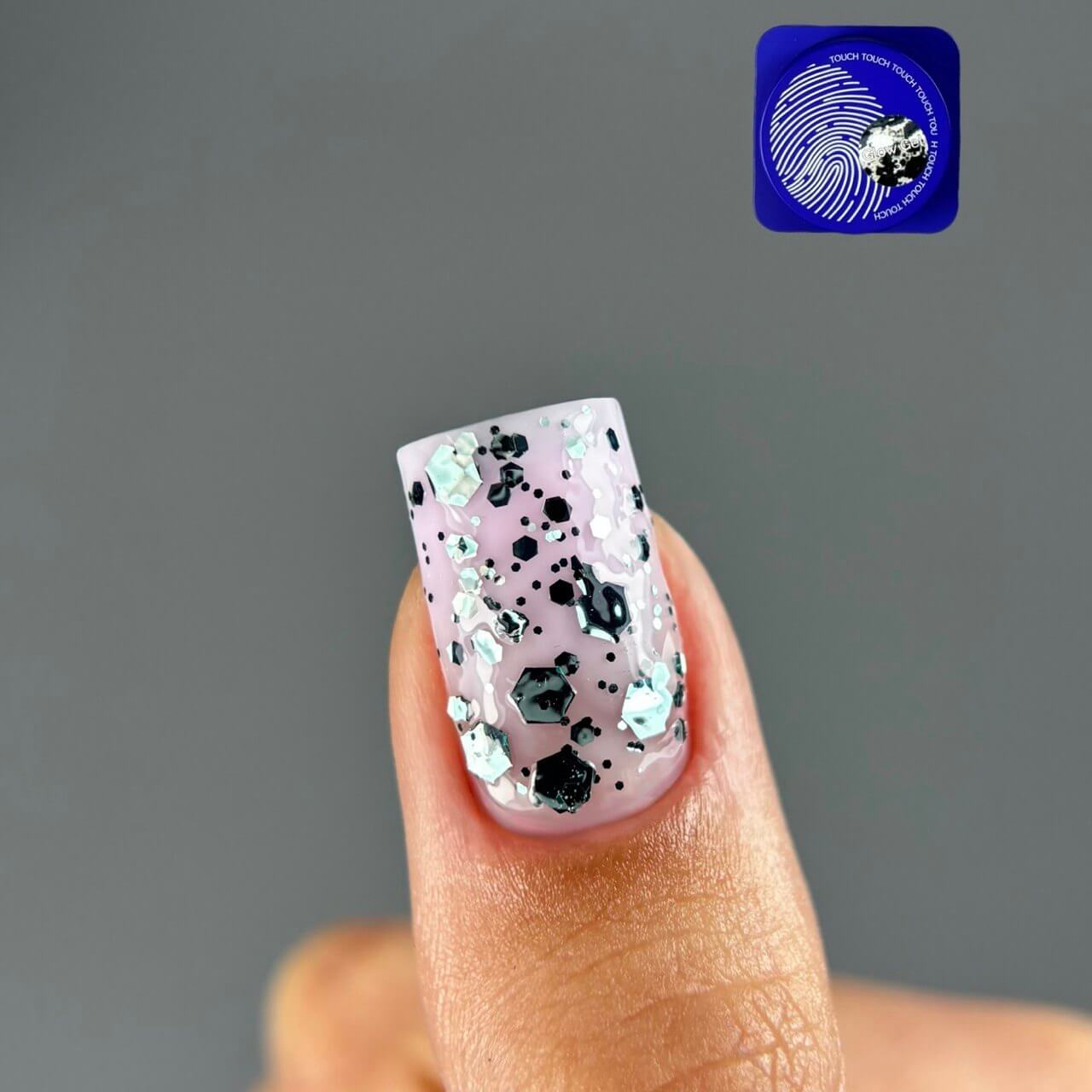 TOUCH Glow Gel 3 — swatch on nail tip, turquoise holographic shimmer