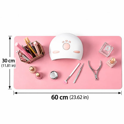 Large pink nail workstation mat with soft textured surface for professional nail salons