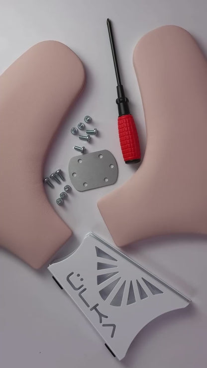 ULKA Arm Rest EGO, black, in use during a manicure service