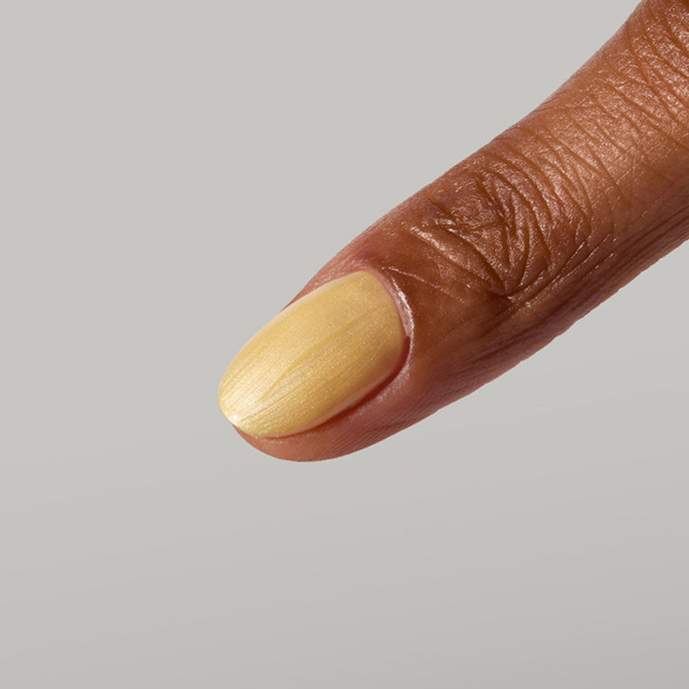 Butter-yellow pearlescent manicure using Amalfi gel color