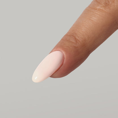 Creamy nude pink-tinted manicure using Bunny Fibre BIAB