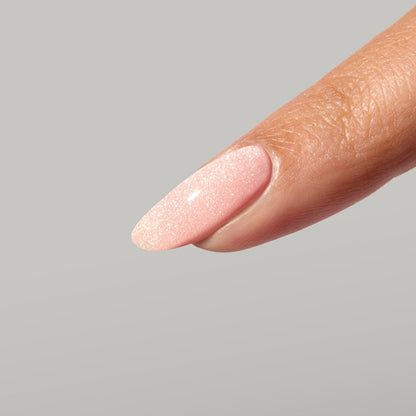 Muted pink champagne cat-eye manicure using Glow Magnetic