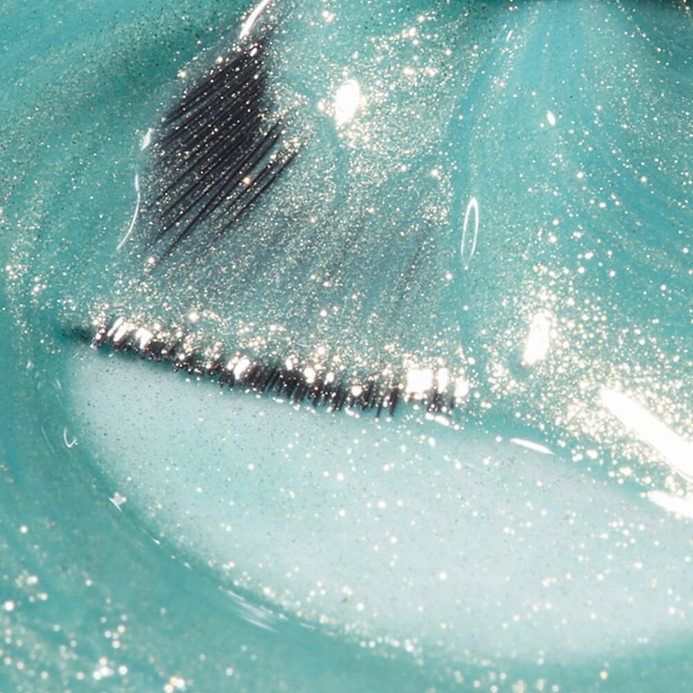 Cat-eye nail art created with Poolside Magnetic gel