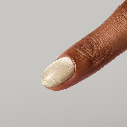 Muted sage champagne cat-eye manicure using Tulum Magnetic