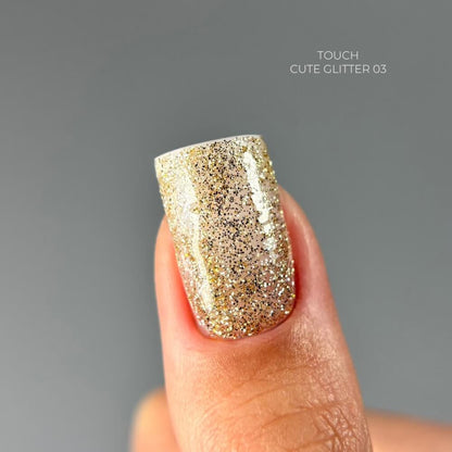 5ml — TOUCH Cute Glitter 3 — swatch on nail tip, gold sparkle finish