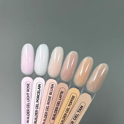 Natural-looking sculpted nails in a delicate pink shade