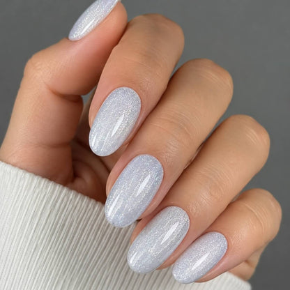 TOUCH Builder Gel Shine Bright 1 — swatch on nail tip, pearly lilac finish
